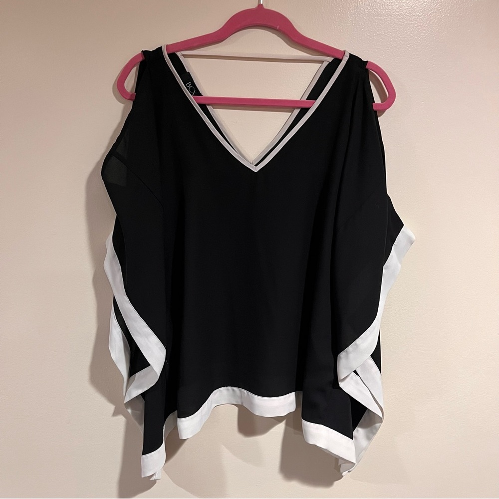 Black and white flowy blouse with bat sleeves